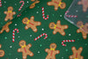Tela de algodón 100 % verde con motivos navideños de galletas de jengibre y bastones de caramelo, vendida por yardas