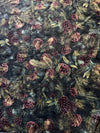 Piñas y ramas sobre fondo negro, 100 % algodón. Precio por yarda