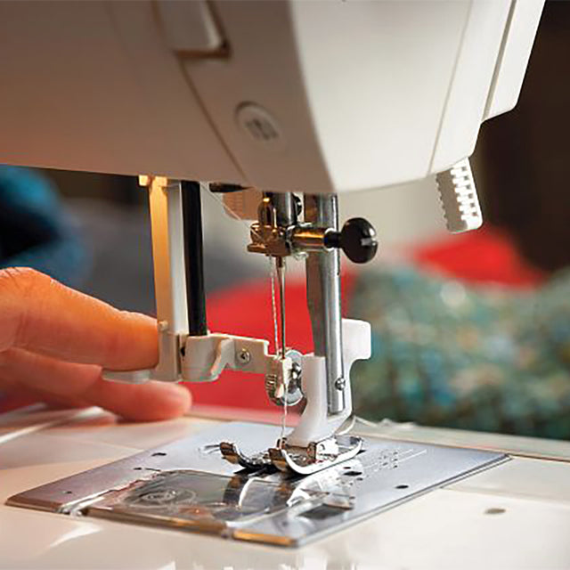 Built-In Needle Threader