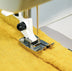 HUSQVARNA® VIKING® Pie para cordón simple