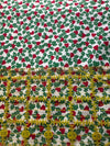 Corazones de acebo vintage sobre fondo crema, 100 % algodón ligero. Precio por yarda.