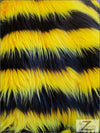 Tela de piel sintética de pelo largo a rayas bicolores, en negro y amarillo