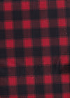 Paño navideño suave con estampado de cuadros rojos tipo «buffalo» sobre fondo negro