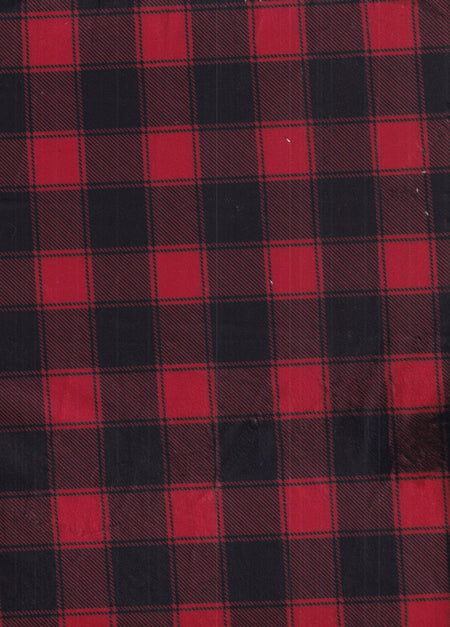 Paño navideño suave con estampado de cuadros rojos tipo «buffalo» sobre fondo negro