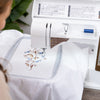 HUSQVARNA® VIKING® Refurbished DESIGNER TOPAZ™ 50 Sewing & Embroidery Machine -- Product Image