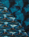 Tela de doble cara preacolchada «Lighthouse Galaxy» en color verde azulado sobre azul, vendida por yardas. Tela decorativa