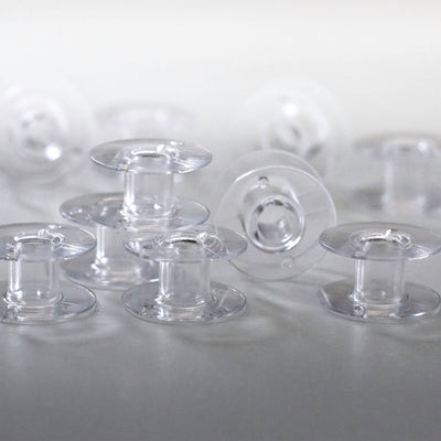 HUSQVARNA® VIKING® Bobinas transparentes, paquete de 10 -- Imagen del producto