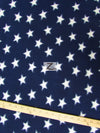 Tejido polar azul y blanco con estrellas