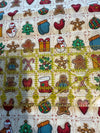 Mini bloques vintage navideños de pan de jengibre sobre fondo crema, 100 % algodón ligero. Precio por yarda.