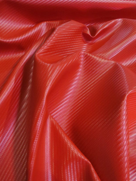 Tejido vinílico marino con diseño de fibra de carbono roja