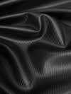 Tejido vinílico marino con efecto fibra de carbono negro