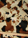 Tejido de felpa de pelo corto con estampado de vaca en marrón, negro y blanco roto / Se vende por metros||color: Marrón/Negro con estampado de vaca