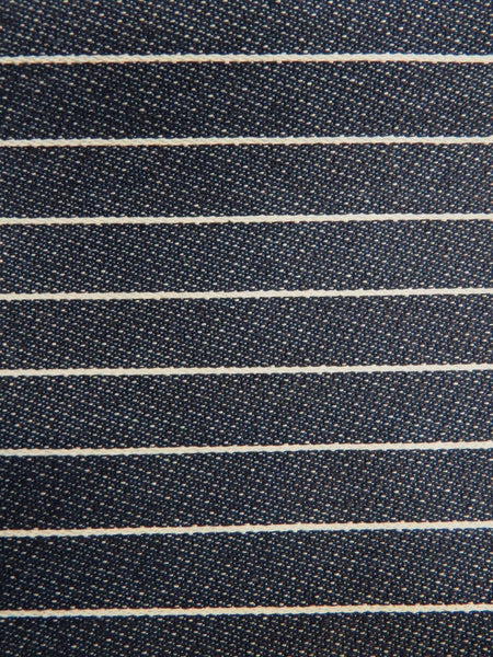 Denim de poliéster y algodón de 6,7 oz con rayas azul marino