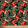 Botas de Papá Noel con bastones de caramelo sobre fondo negro