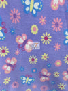 Tejido polar morado con estampado floral de mariposas y amanecer