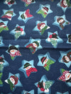 Muñecos de nieve vintage con estrellas sobre fondo azul, 100 % algodón ligero. Precio por yarda.