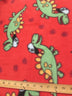 Playful Dinosaurs Red Fleece Fabric