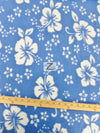 Tejido polar hawaiano con estampado de flores en azul bebé