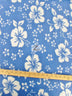 Tejido polar hawaiano con estampado de flores en azul bebé