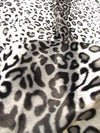 Tela de felpa de pelo corto con estampado de leopardo en color rosa/fucsia / Se vende por metros