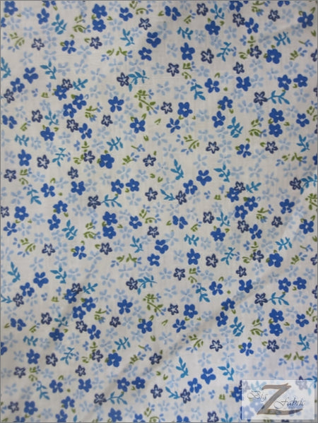 Tela de poliéster y algodón con estampado de mini flores azules