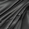Stitch & Sparkle, 100 % poliéster, charmeuse de 57" de ancho, negro liso, se vende por yardas