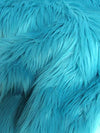 Tela de pelo sintético peludo, liso y de color turquesa, reactiva a los rayos UV / Se vende por metros