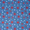 Tela SINGER®, 100 % algodón, con estrellas rojas y azules sobre fondo texturizado, vendida por metros
