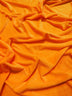 Tela Minky lisa de color naranja neón, suave al tacto / Se vende por metros