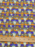 Tela de poliéster y algodón con estampado de jirafas en color morado