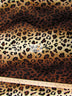 Tejido de felpa de pelo corto con estampado de leopardo en color marrón/marrón claro / Se vende por metros