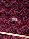 Tejido de felpa de pelo corto con estampado de cebra en rayas finas rojas y negras / Se vende por metros||color: Cebra en rayas finas rojas y negras