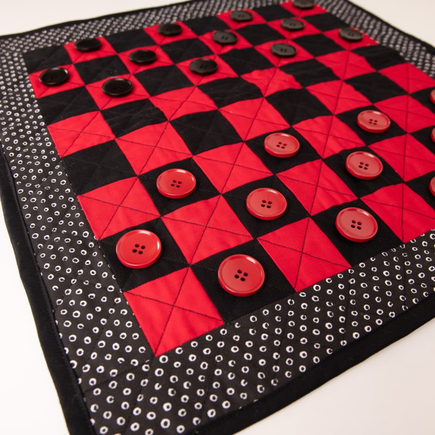 Tablero de juego de damas acolchado